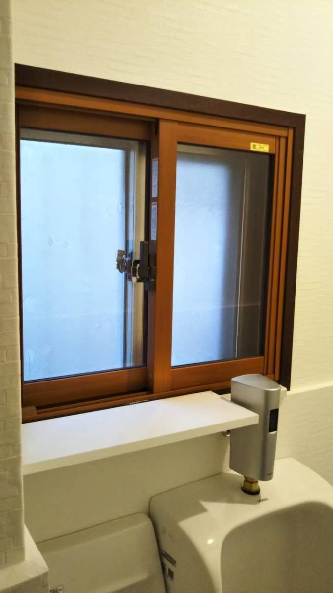 窓ドア京橋駅前店の東大阪市  トイレにインプラスの施工後の写真1
