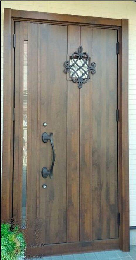 窓ドア京橋駅前店の泉大津市でアルミ親子ドアから、木目調のリシェント玄関ドア3　D77型へ・・・アンティークなドア交換の施工後の写真1